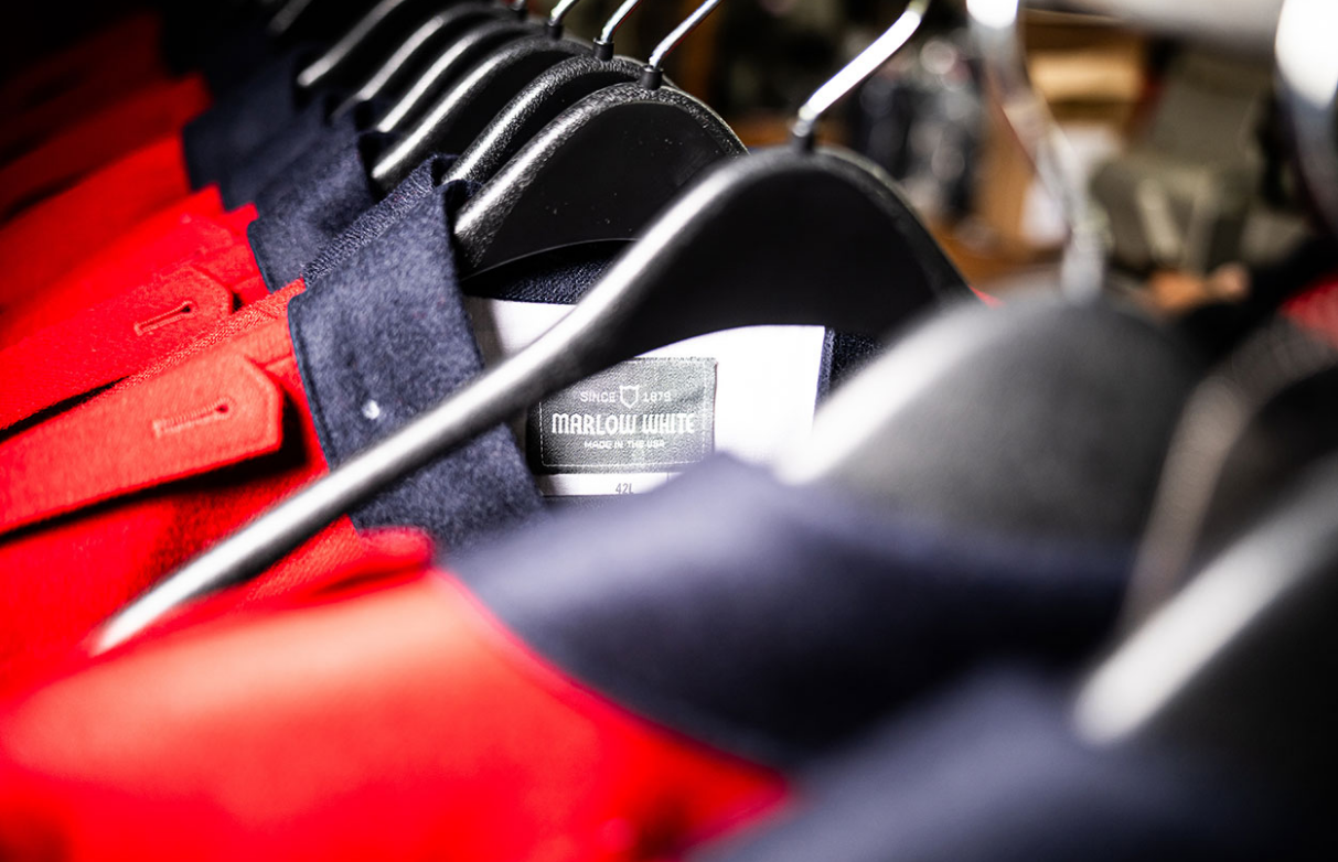 A red white and blue uniform on a hanger